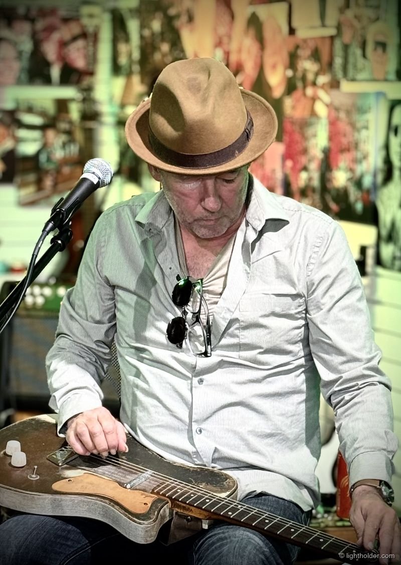 Mike McNevin playing slide guitar