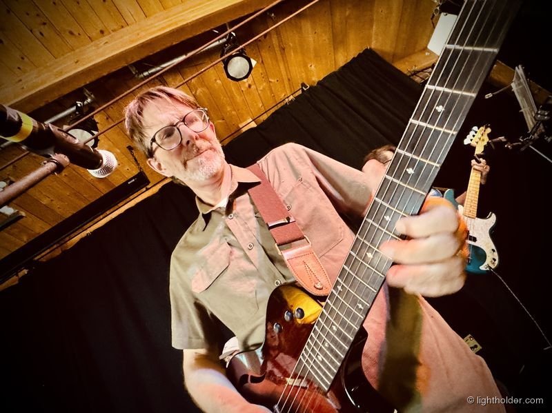 Kwame Copeland plays guitar